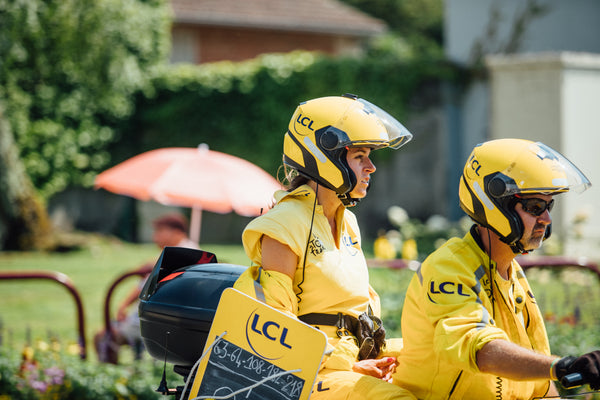 The lady in yellow who rides at the front of the Tour de France